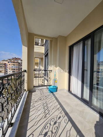 Уютная квартира 1+1 в новом комплексе в центре Махмутлара, 56 кв.м. - Ракурс 7