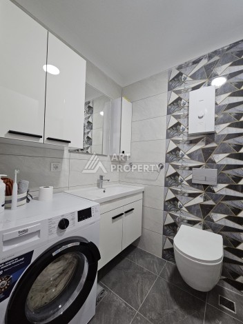 Уютная квартира 1+1 в новом комплексе в центре Махмутлара, 56 кв.м. - Ракурс 15