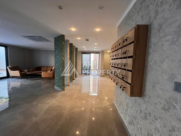 Квартира 2+1 в современном комплексе в центре Махмутлара, 850 метров до моря. - Ракурс 8