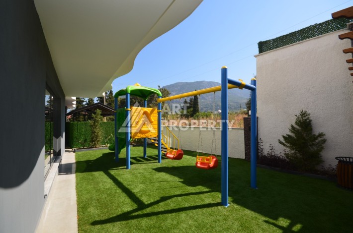 Квартира 2+1 в современном комплексе в центре Махмутлара, 850 метров до моря. - Ракурс 18