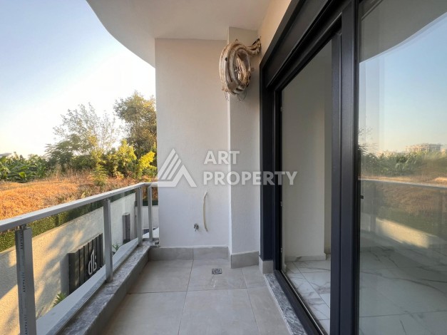 Квартира 2+1 в современном комплексе в центре Махмутлара, 850 метров до моря. - Ракурс 24