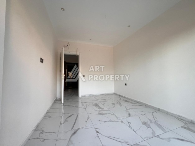 Квартира 2+1 в современном комплексе в центре Махмутлара, 850 метров до моря. - Ракурс 26