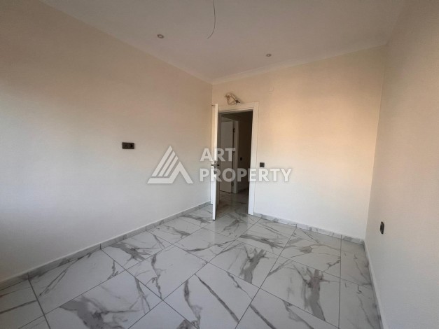 Квартира 2+1 в современном комплексе в центре Махмутлара, 850 метров до моря. - Ракурс 31