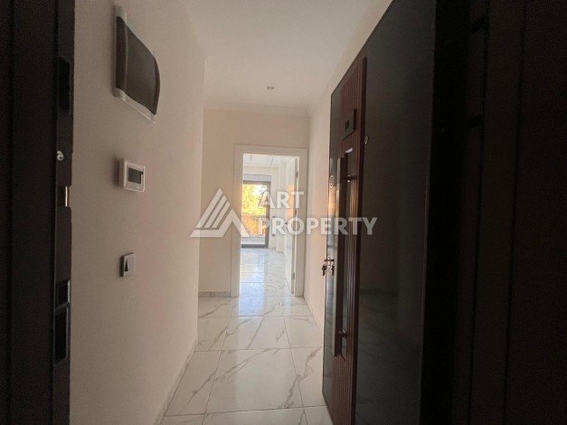 Квартира 2+1 в современном комплексе в центре Махмутлара, 850 метров до моря. - Ракурс 29