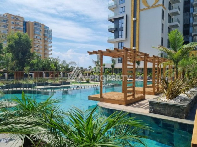 Элитная квартира 1+1 с прямым видом на в Махмутларе, 55 кв.м. - Ракурс 20