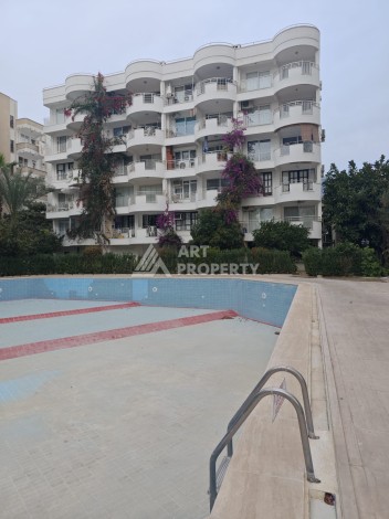 Квартира 2+1 на первой береговой линии 75 кв.м. в Махмутларе - Ракурс 19