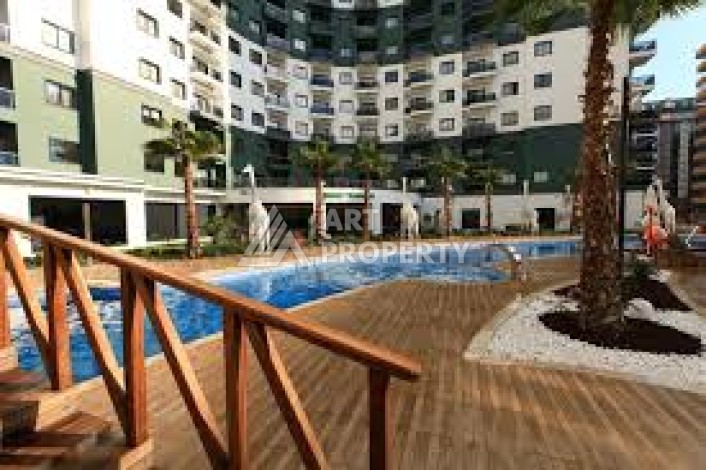 Квартира 1+1 в популярной резиденции, 55 кв.м. Махмутлар, Алания - Ракурс 24