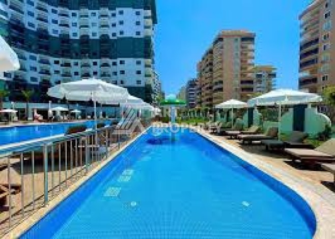 Квартира 1+1 в популярной резиденции, 55 кв.м. Махмутлар, Алания - Ракурс 34