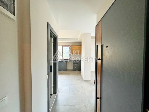 Двухуровневые апартаменты 2+1 с видом на море и горы в Каргыджаке, 112 кв.м. - Ракурс 4