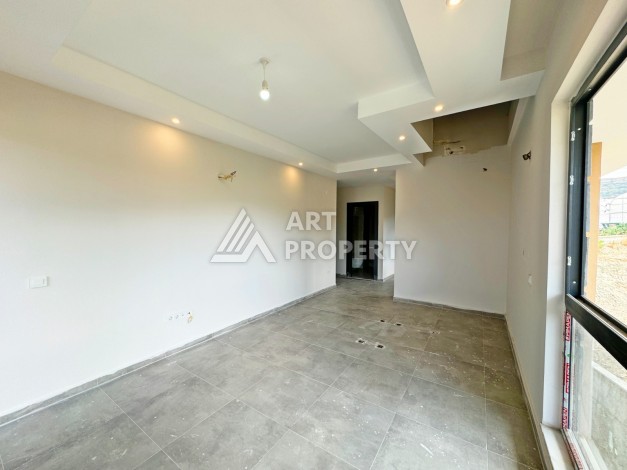 Двухуровневые апартаменты 2+1 с видом на море и горы в Каргыджаке, 112 кв.м. - Ракурс 6