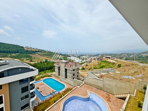 Двухуровневые апартаменты 2+1 с видом на море и горы в Каргыджаке, 112 кв.м. - Ракурс 11