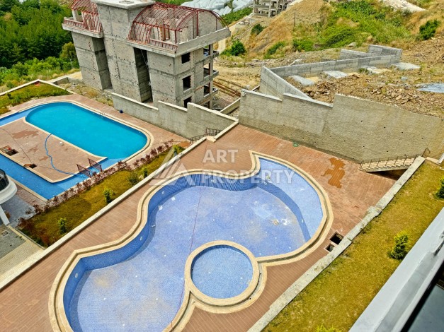 Двухуровневые апартаменты 2+1 с видом на море и горы в Каргыджаке, 112 кв.м. - Ракурс 13