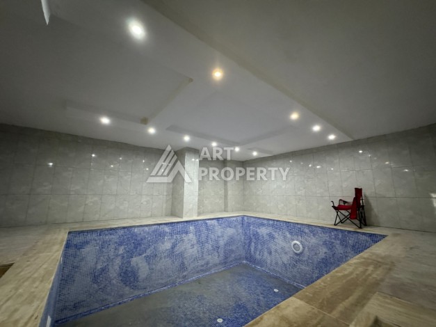 Двухуровневые апартаменты 2+1 с видом на море и горы в Каргыджаке, 112 кв.м. - Ракурс 15