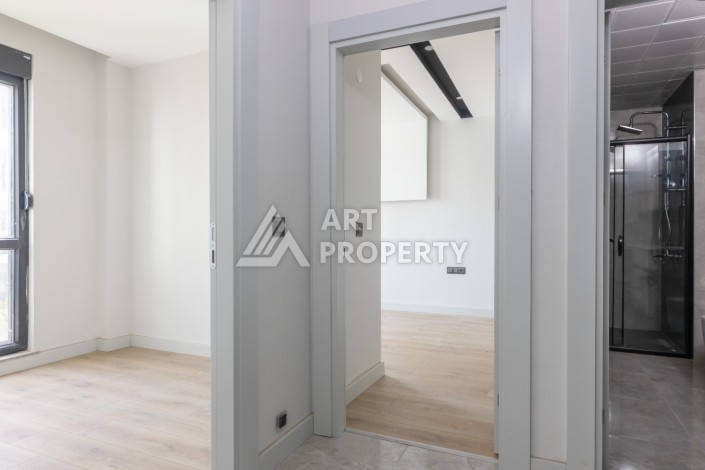 Современные квартиры 1+1 и 2+1 от 60 кв.м. в районе Алтынташ, Анталья - Ракурс 10