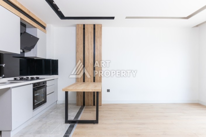 Современные квартиры 1+1 и 2+1 от 60 кв.м. в районе Алтынташ, Анталья - Ракурс 12