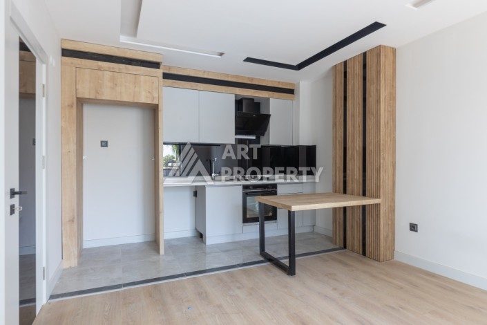 Современные квартиры 1+1 и 2+1 от 60 кв.м. в районе Алтынташ, Анталья - Ракурс 17