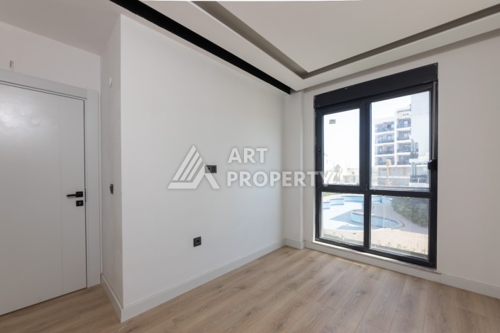 Современные квартиры 1+1 и 2+1 от 60 кв.м. в районе Алтынташ, Анталья - Ракурс 26