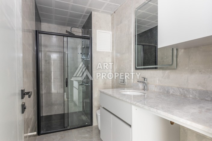 Современные квартиры 1+1 и 2+1 от 60 кв.м. в районе Алтынташ, Анталья - Ракурс 32