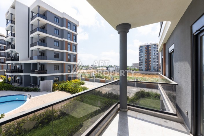 Современные квартиры 1+1 и 2+1 от 60 кв.м. в районе Алтынташ, Анталья - Ракурс 34