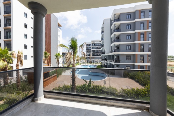 Современные квартиры 1+1 и 2+1 от 60 кв.м. в районе Алтынташ, Анталья - Ракурс 35