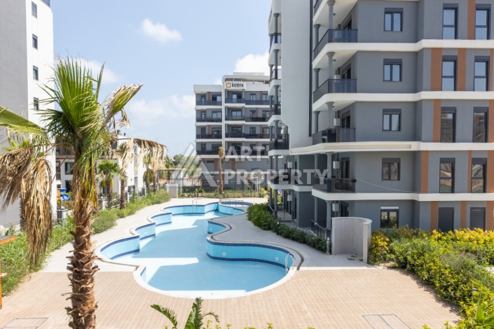 Современные квартиры 1+1 и 2+1 от 60 кв.м. в районе Алтынташ, Анталья - Ракурс 36