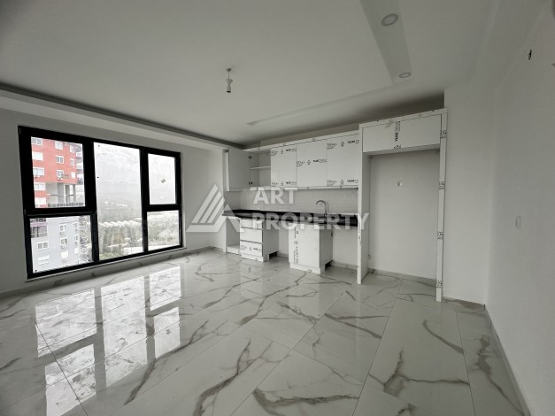 Квартиры 2+1, 3+1 и 4+1 в 700 метрах от моря.  Махмутлар, Алания - Ракурс 8