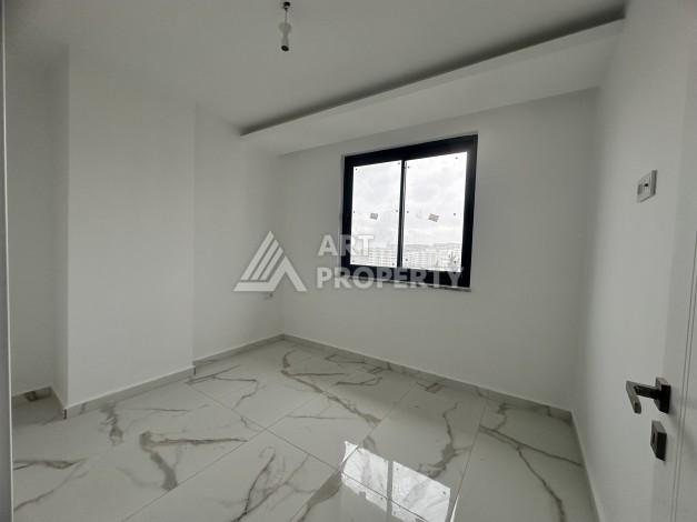 Квартиры 2+1, 3+1 и 4+1 в 700 метрах от моря.  Махмутлар, Алания - Ракурс 18