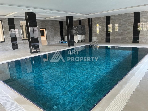 Апартаменты 1+1 с видом на бассейн, 50 кв.м. Авсаллар, Алания - Ракурс 6