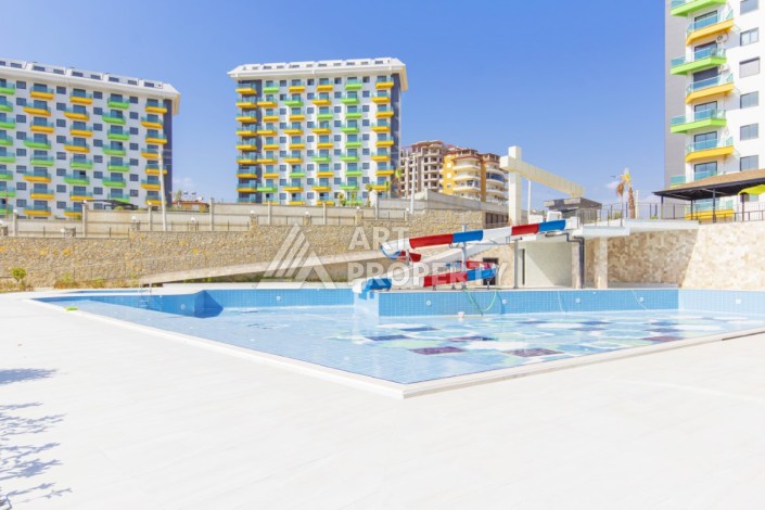 Апартаменты 1+1 с видом на бассейн, 50 кв.м. Авсаллар, Алания - Ракурс 15