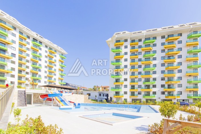 Апартаменты 1+1 с видом на бассейн, 50 кв.м. Авсаллар, Алания - Ракурс 16