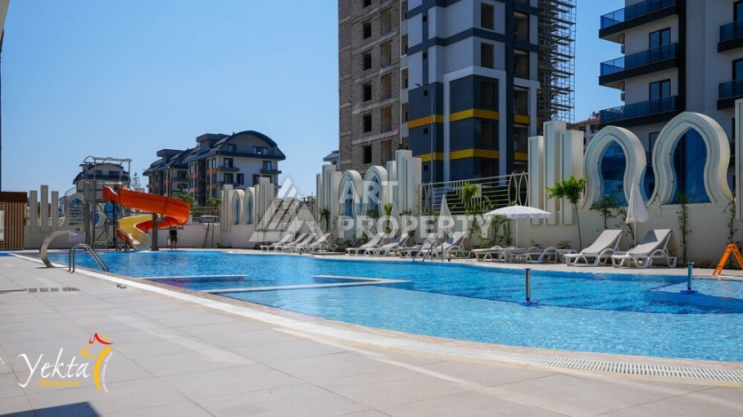 Видовая квартира 1+1 в элитном ЖК, 54 кв.м. Махмутлар, Алания - Ракурс 33