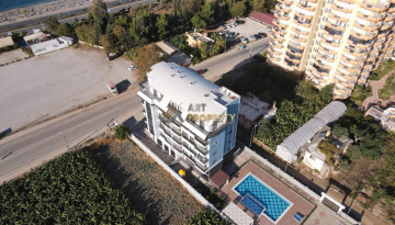 Двухкомнатные квартиры в новом современном комплексе в районе Каргыджак, Алания,65 м2 - Ракурс 25