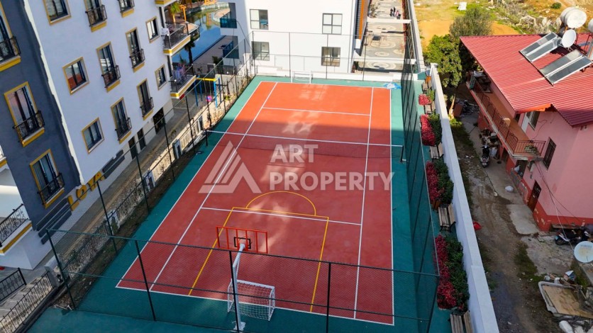 Просторная квартира 1+1 в центре Махмутлара, всего 700 м до моря - Ракурс 3