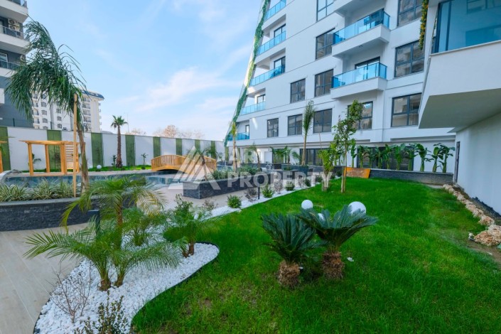 Просторная квартира 1+1 в центре Махмутлара, всего 700 м до моря - Ракурс 4