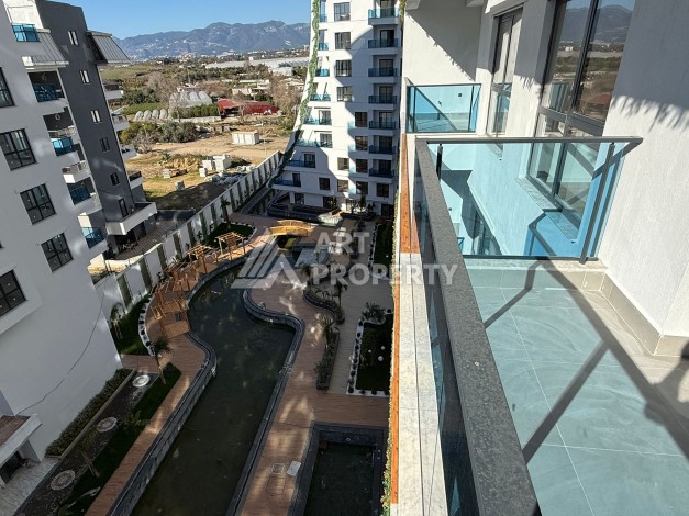 Просторная квартира 1+1 в центре Махмутлара, всего 700 м до моря - Ракурс 8