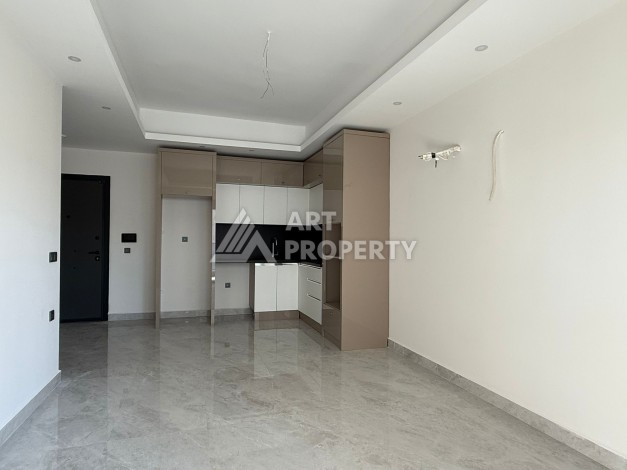 Просторная квартира 1+1 в центре Махмутлара, всего 700 м до моря - Ракурс 10