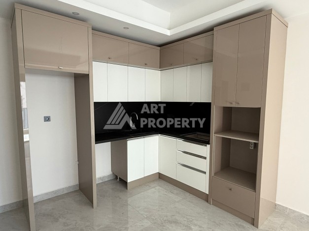 Просторная квартира 1+1 в центре Махмутлара, всего 700 м до моря - Ракурс 11