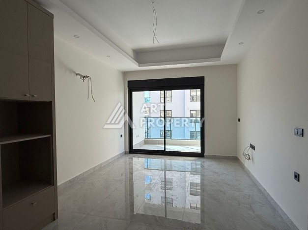 Просторная квартира 1+1 в центре Махмутлара, всего 700 м до моря - Ракурс 13