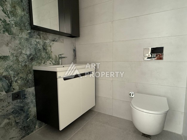 Просторная квартира 1+1 в центре Махмутлара, всего 700 м до моря - Ракурс 16