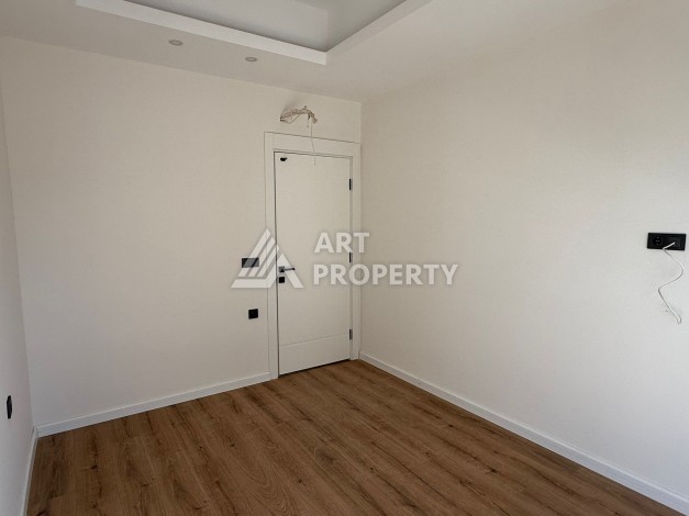 Просторная квартира 1+1 в центре Махмутлара, всего 700 м до моря - Ракурс 19