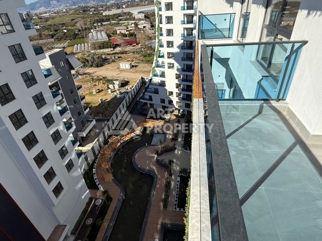 Современная квартира 1+1 на 10 этаже. Новая резиденция в центре Махмутлара. - Ракурс 6