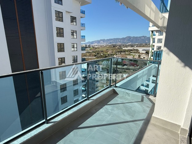 Современная квартира 1+1 на 10 этаже. Новая резиденция в центре Махмутлара. - Ракурс 7