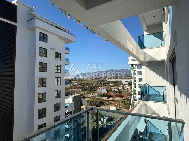 Современная квартира 1+1 на 10 этаже. Новая резиденция в центре Махмутлара. - Ракурс 8