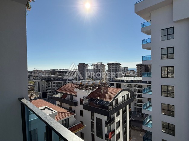 Современная квартира 1+1 на 10 этаже. Новая резиденция в центре Махмутлара. - Ракурс 9