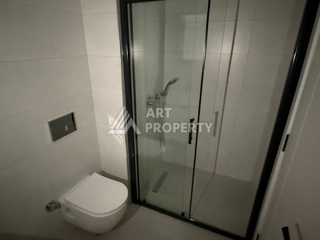 Современная квартира 1+1 на 10 этаже. Новая резиденция в центре Махмутлара. - Ракурс 10