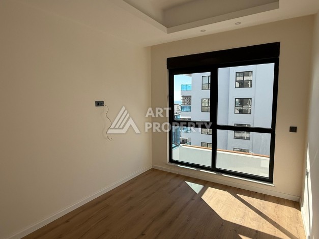 Современная квартира 1+1 на 10 этаже. Новая резиденция в центре Махмутлара. - Ракурс 14