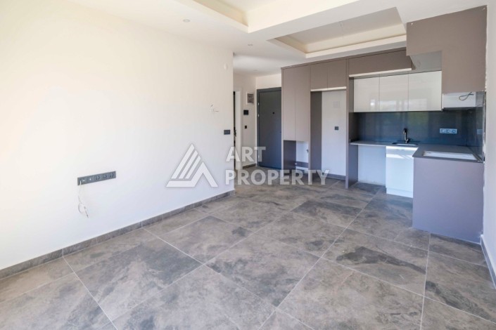 Квартира 1+1 в бутик-комплексе в Махмутларе, 55 кв.м. - Ракурс 7