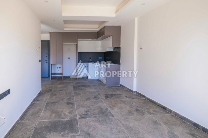 Квартира 1+1 в бутик-комплексе в Махмутларе, 55 кв.м. - Ракурс 9