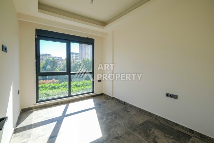 Квартира 1+1 в бутик-комплексе в Махмутларе, 55 кв.м. - Ракурс 16