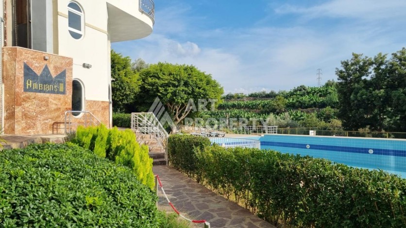 Меблированная квартира 2+1 с видом на горы в Махмутларе, 110 кв.м. - Ракурс 16